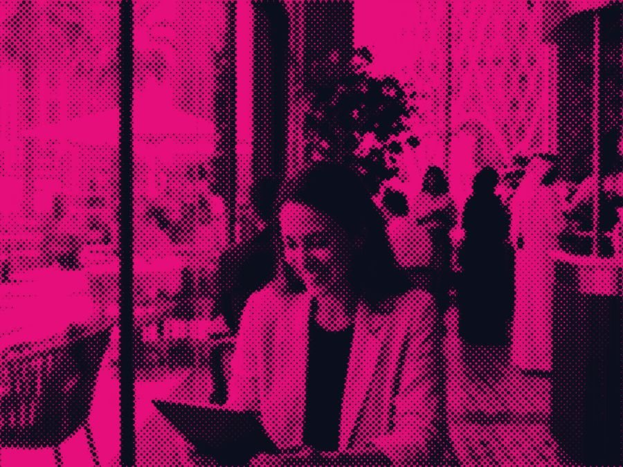 An entrepreneur reading results on a tablet